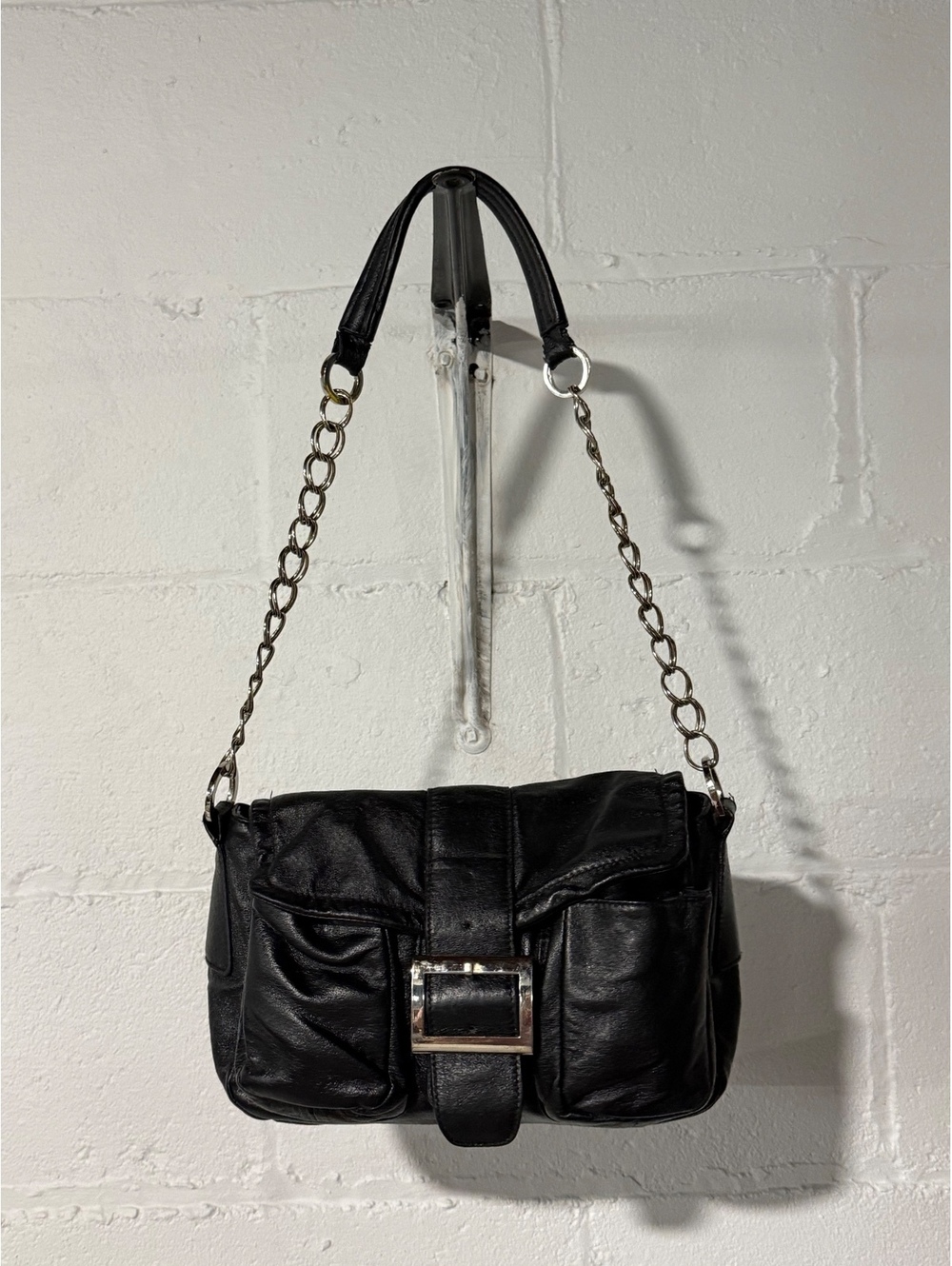 Wilson’s leather black shoulder bag purse with silver tone chain accent